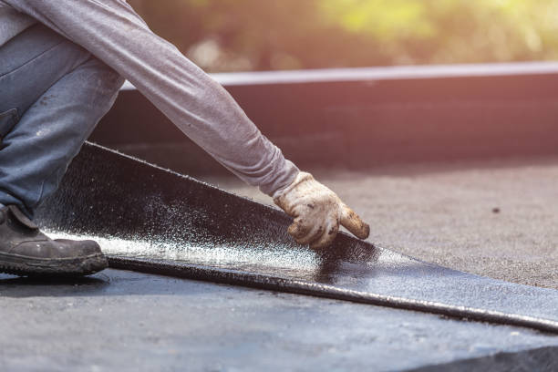 Professional Basement Waterproofing technician working in Columbia, PA
